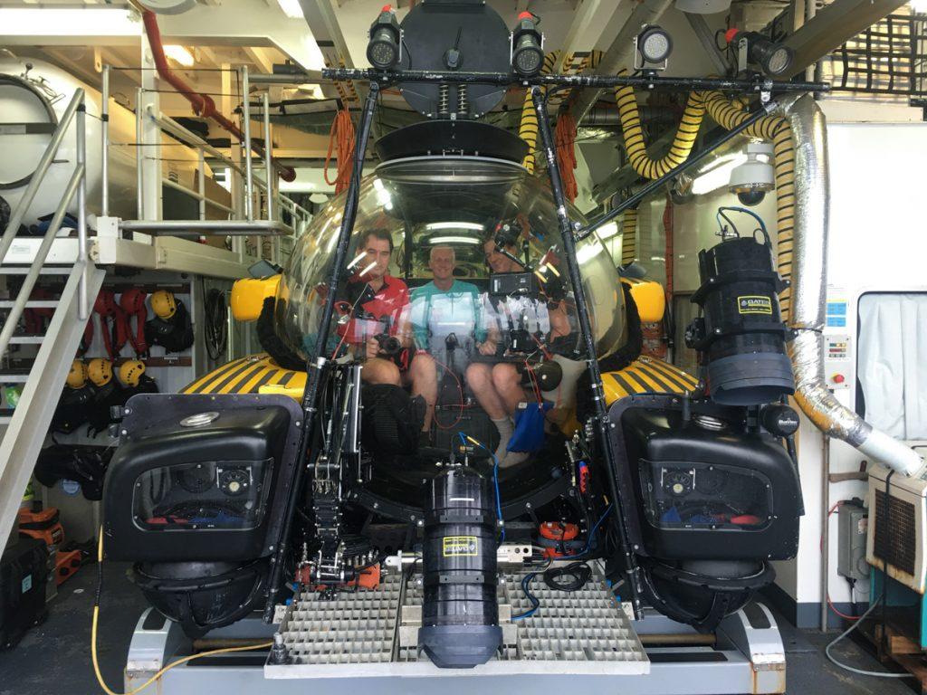 Preparing to dive in Triton Submersible to film deepsea coral reefs for Netflix Our Planet BBC Netflix Apple TV Wildlife Filming Filmmaking Underwater Natural History Ocean Cinematography Gates  Housings Nauticam submarine REvo Rebreathers SCUBA
