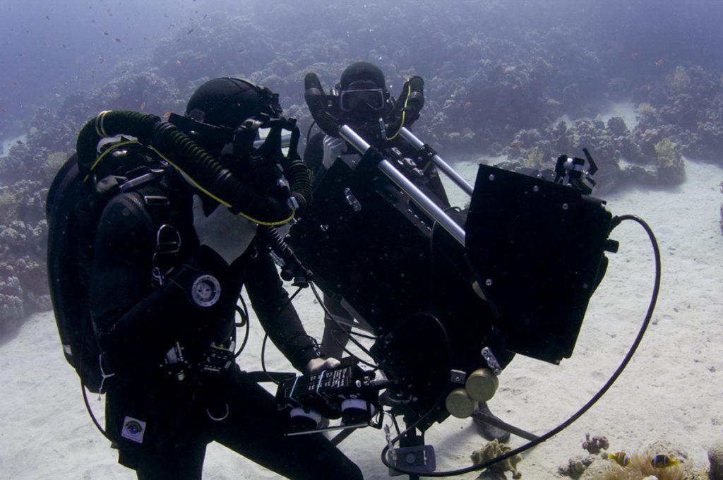 Doug Anderson and Hugh Miller communicate with through water OTS communications using Biomarine Mk 155 Rebreathers for BBC’s Enchanted Kingdom, Red Sea BBC Netflix Apple TV Wildlife Filming Filmmaking Underwater Natural History Ocean Cinematography Gates  Housings Nauticam REvo Rebreathers SCUBA