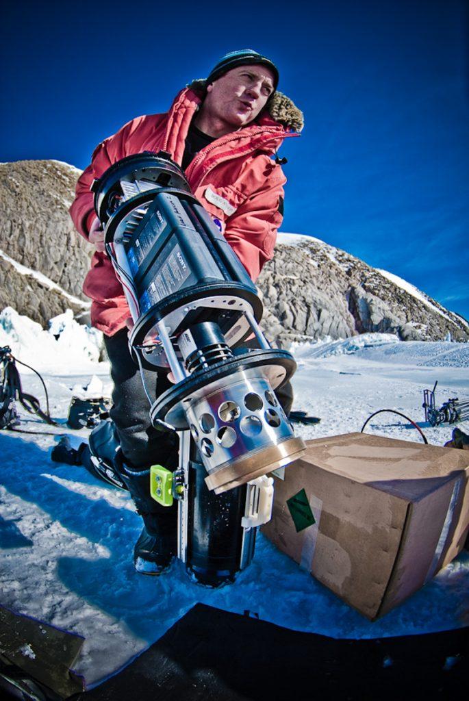 Doug Anderson preparing a battery powered underwater light for BBC’s FrozenPlanet in Ross Island, Antartica   BBC Netflix Apple TV Wildlife Filming Filmmaking Underwater Natural History Ocean Cinematography Gates  Housings Nauticam REvo Rebreathers SCUBA