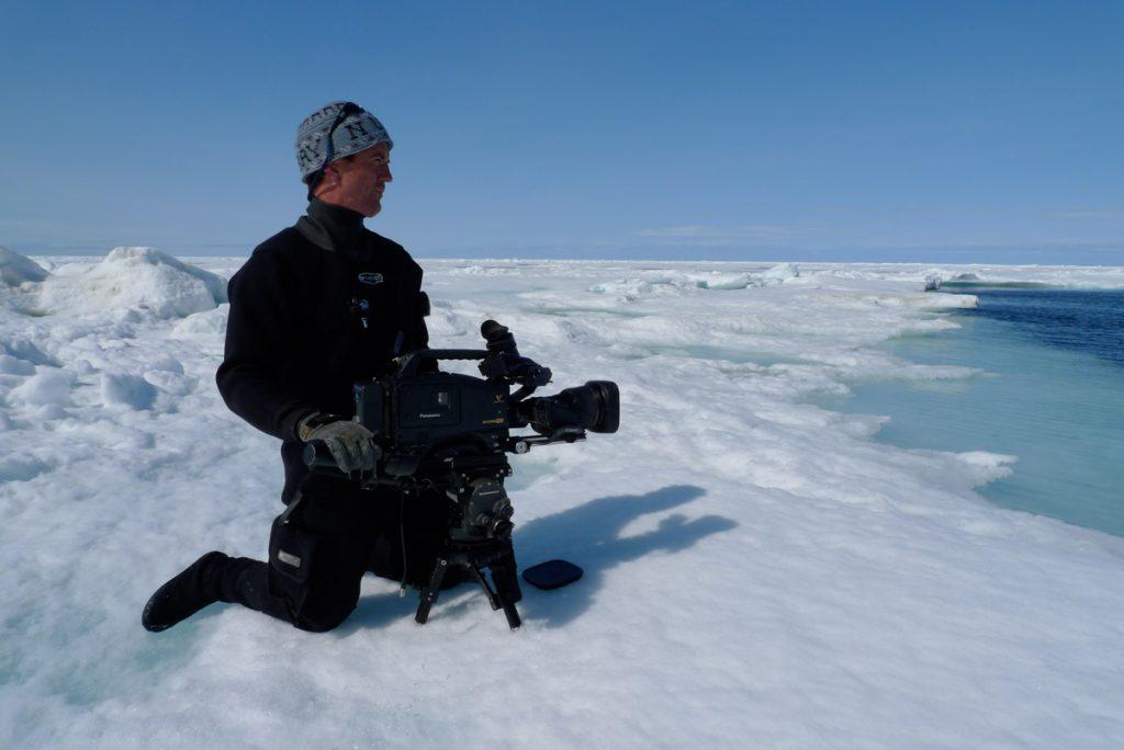 Doug Anderson filming Ice Whales from the flow edge.  BBC Netflix Apple TV Wildlife Filming Filmmaking Underwater Natural History Ocean Cinematography Gates  Housings Nauticam REvo Rebreathers SCUBA Finistare clothing