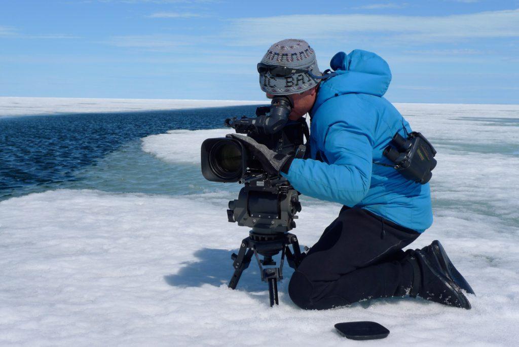 Doug Anderson filming Ice Whales from the flow edge.  BBC Netflix Apple TV Wildlife Filming Filmmaking Underwater Natural History Ocean Cinematography Gates  Housings Nauticam REvo Rebreathers SCUBA Finistare clothing